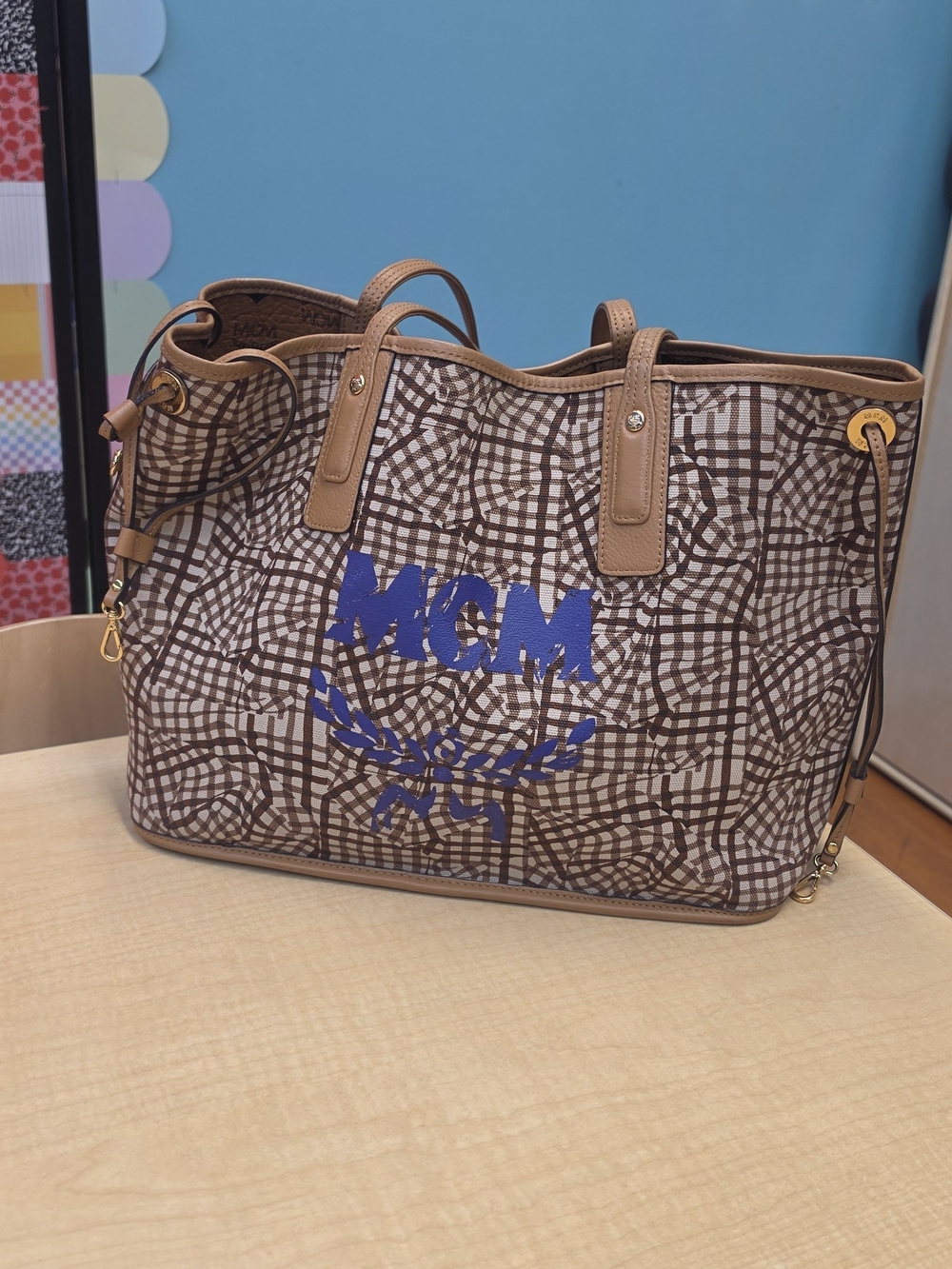 MCM Brown Logo Canvas Tote Bag with Blue Accent